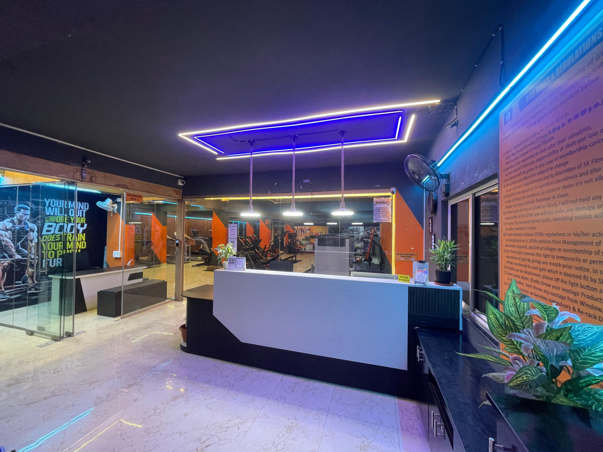 Reception desk and glass-walled office at SK Fitness Gym, Chandan Nagar, Kharadi, Pune