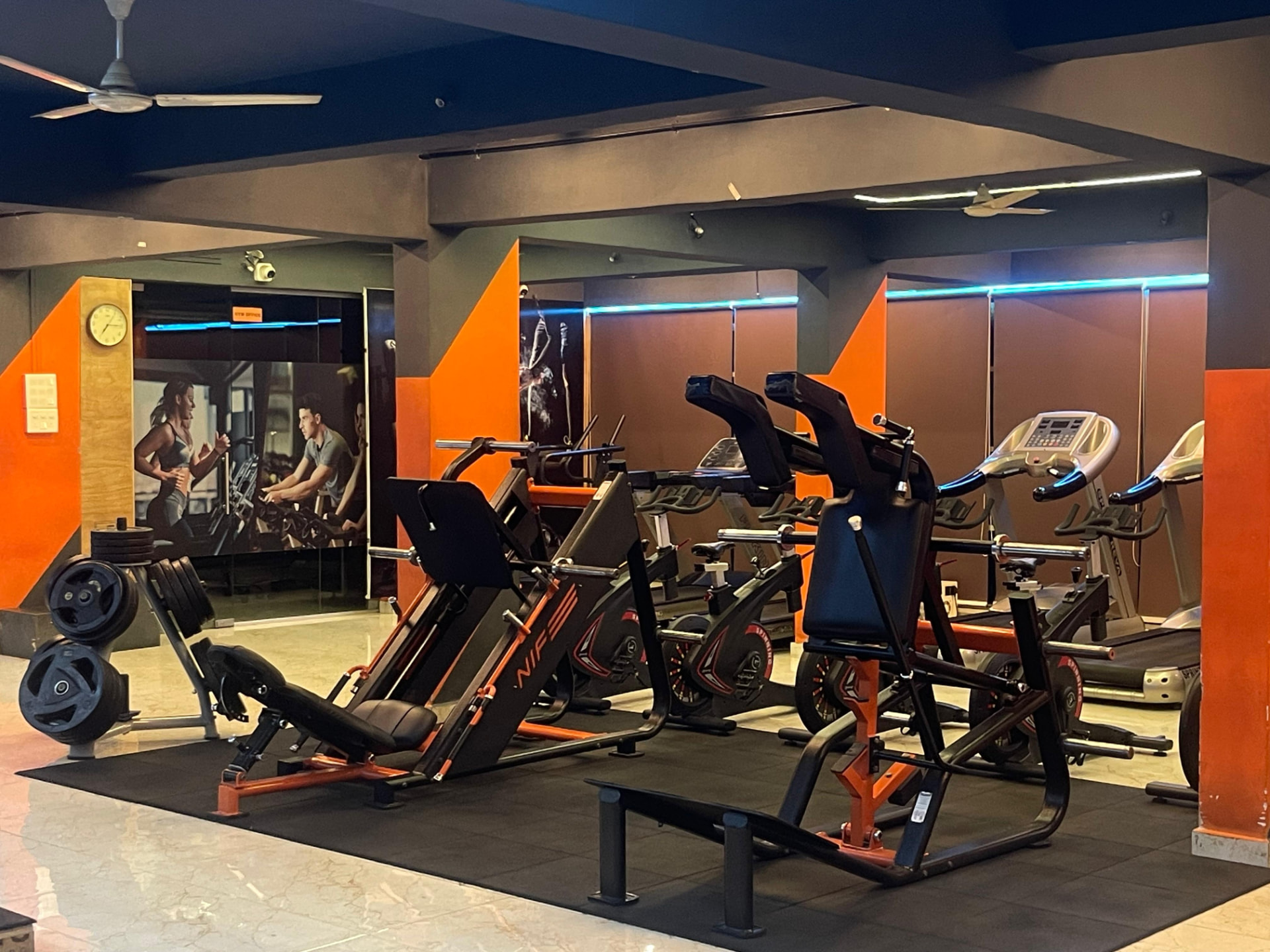Plate-loaded leg press and strength machines on the gym floor at SK Fitness Gym Kharadi